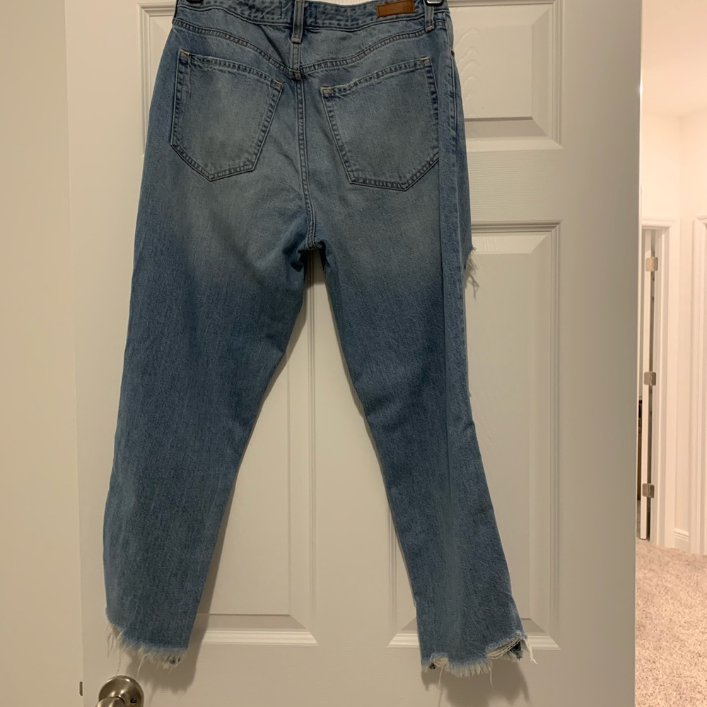 Straight leg jeans with rips